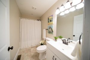 Louisville KY Home Staging, Louisville KY Interior Design, Louisville KY Renovation, Shotgun Home Stage, Sold in less than a month, light walls, stainless appliances, light linens, lighter colors make rooms look more spacious, hardwood flooring